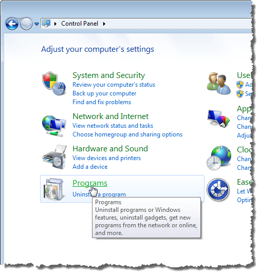 Kliknięcie łącza Programy w Windows 7